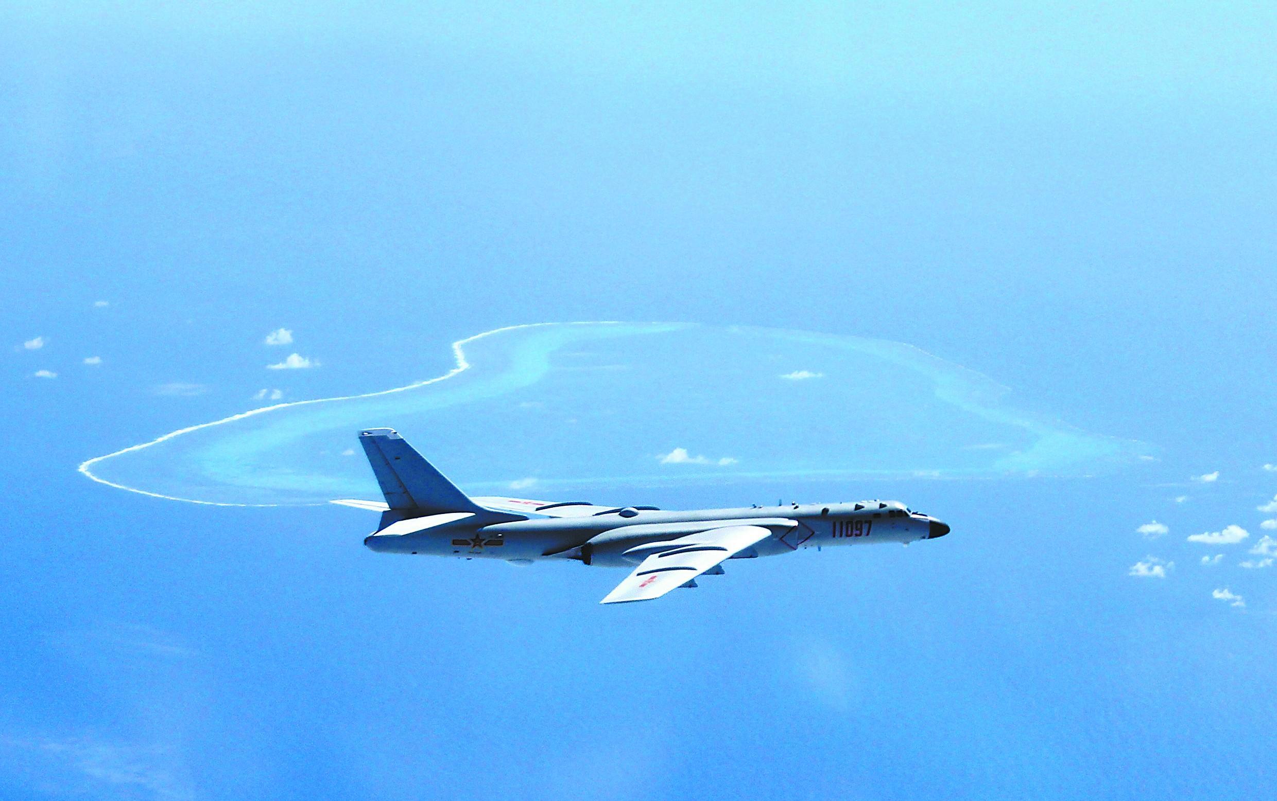 中国空军巡航黄岩岛将成常态 菲媒:中国秀肌肉