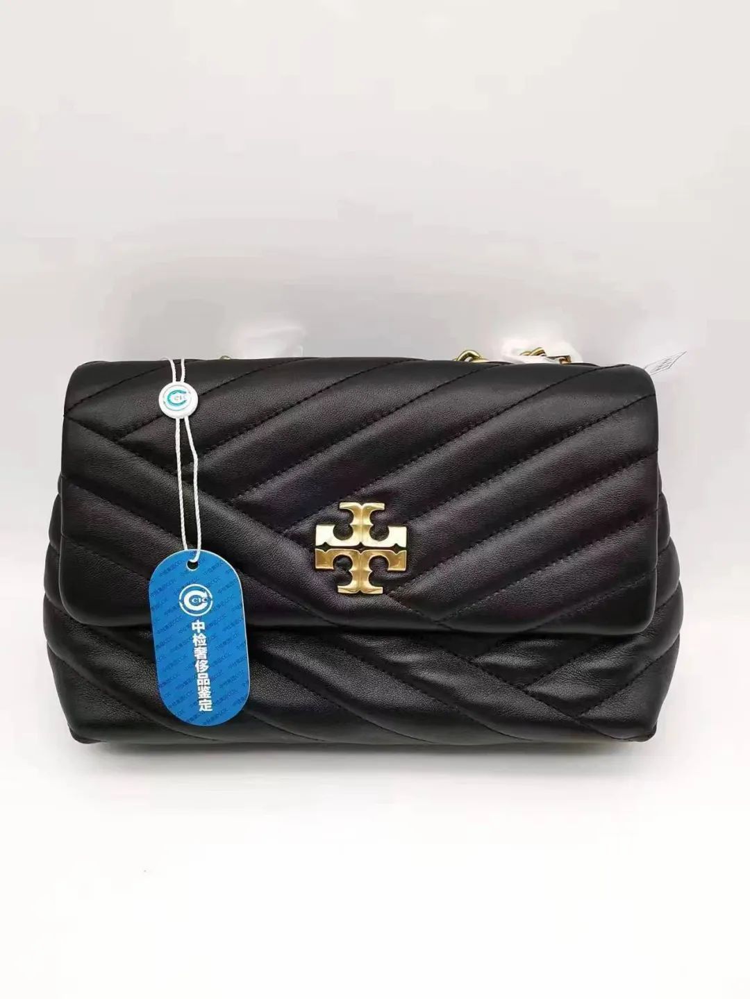 电商平台红布林售包再现真假争议,京沪两地鉴定机构意见不一