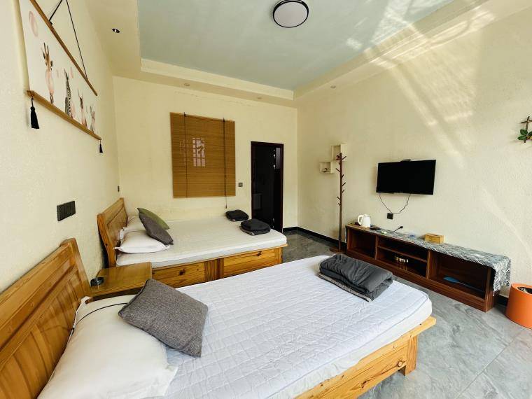 天津蓟县吉姆冒险世界悦心雅居民宿假山绿植入门就眼前一亮