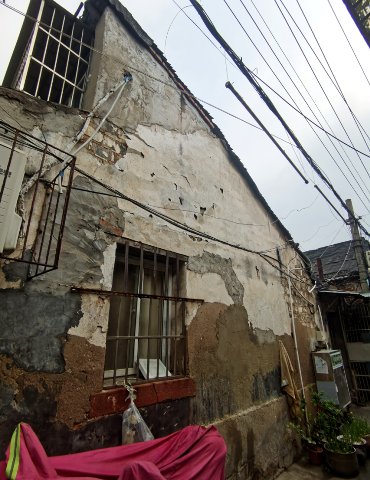 如果说黄泥塘有趣的店名,让我们一路好奇,那老门西现存房屋面貌,则让