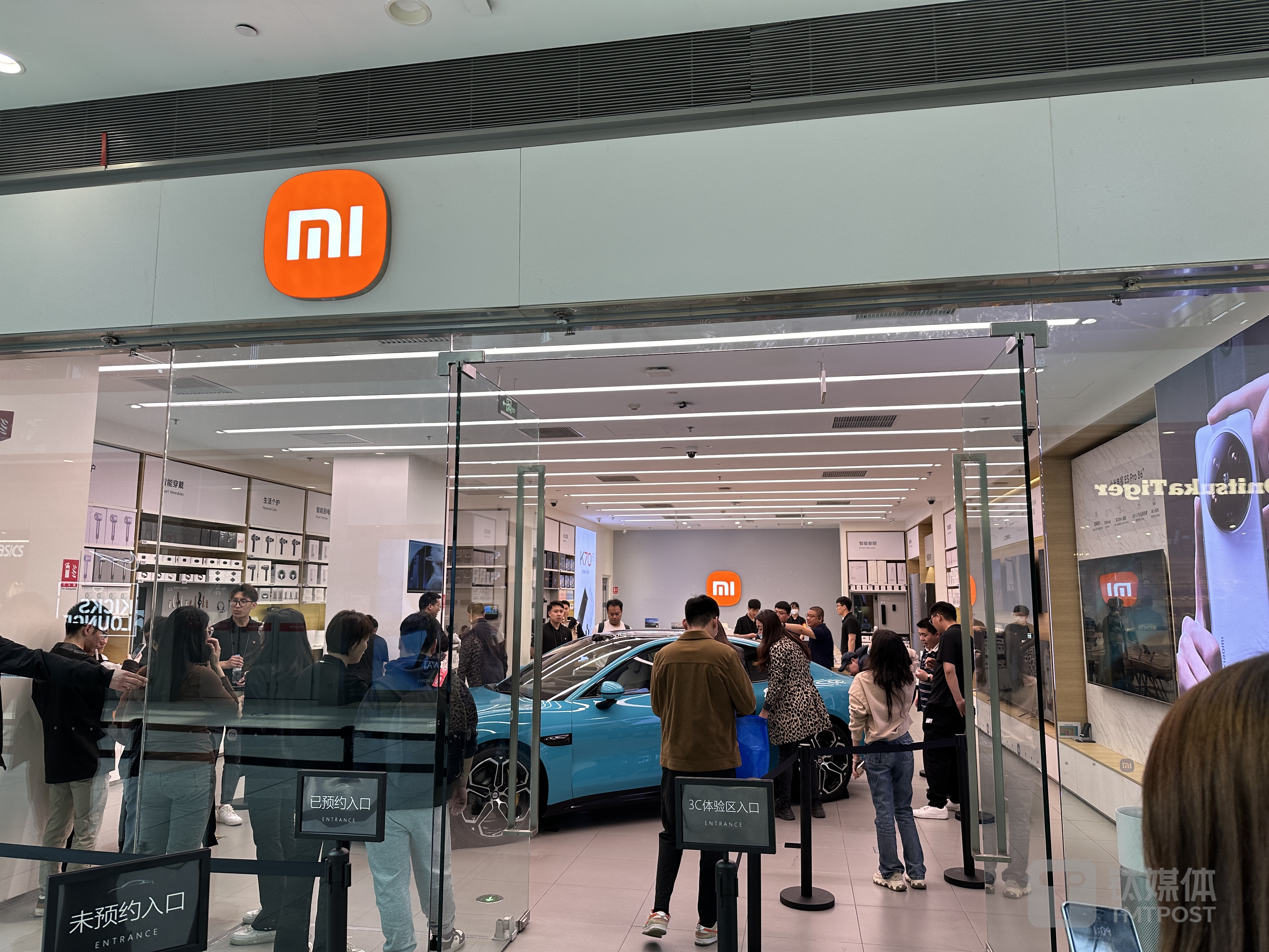 小米su7悬念揭晓分外卖力的雷军没有惊喜的定价钛度车库