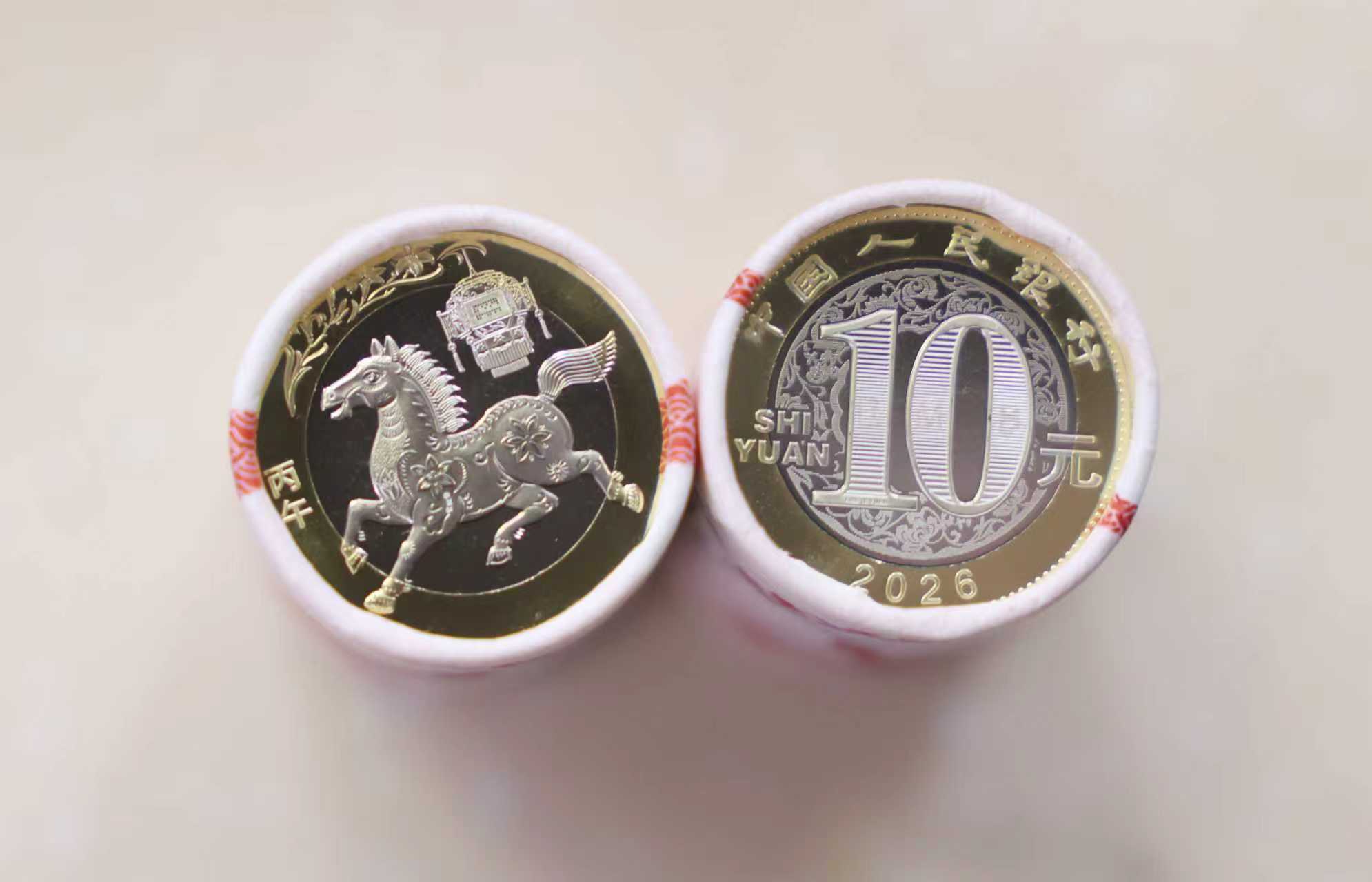 直击马年纪念币钞首发：市民兑换热，黄牛热炒“靓号”，银行建议错峰_财富号_东方财富网