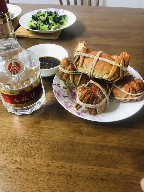 得之坦然失之淡然争其必然顺其自然大笑浮云浮云整天喝着五粮液望着蟹